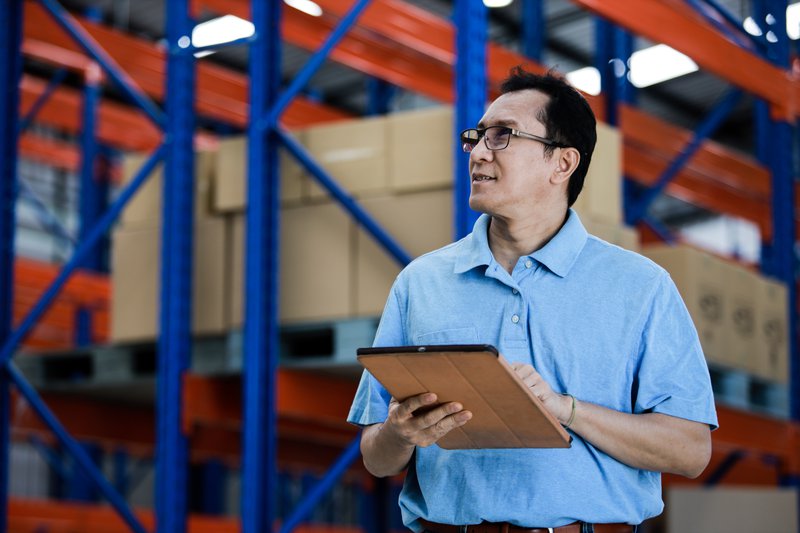 business owner managing his supply chain touch points
