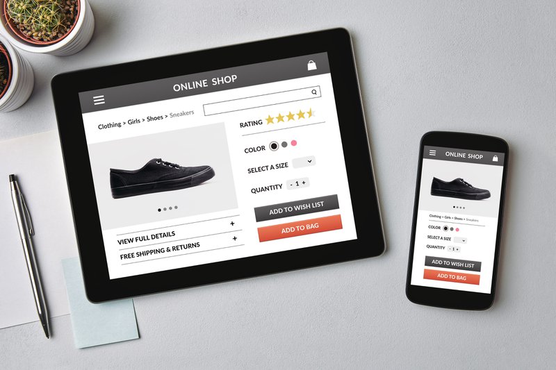 shoe product page shown on table and mobile phone